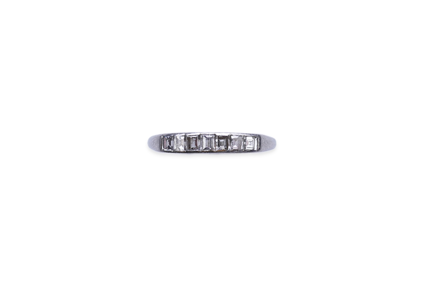 A diamond half-eternity ring, first half 20th century